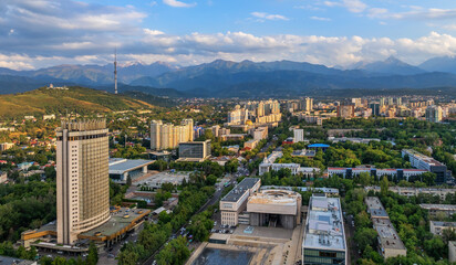 Modern Attractions - A vibrant cityscape featuring sleek skyscrapers, bustling streets, and lively pedestrian areas with shops, cafes, and nightlife.