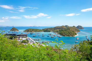 "Stunning panoramic view of Nusa Islands Bali, featuring dramatic cliffs, crystal-clear turquoise waters, and vibrant green landscapes, offering a serene escape from the mainland."