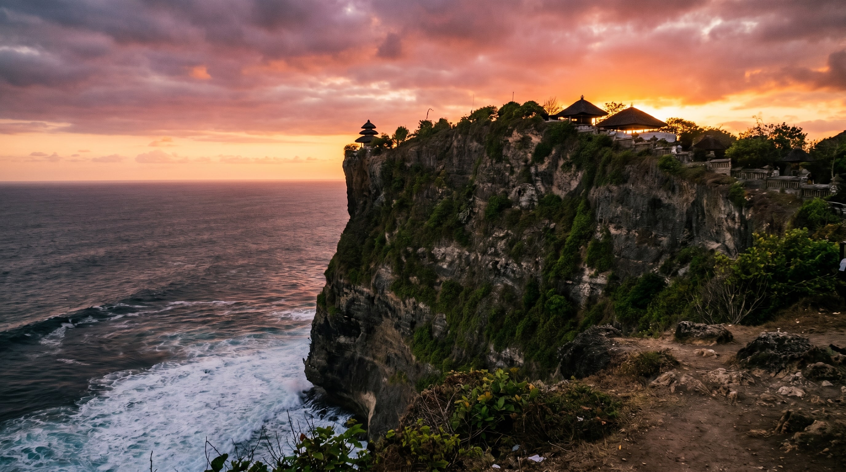 Uluwatu Temple on a clifftop at sunset, a highlight of any Bali itinerary