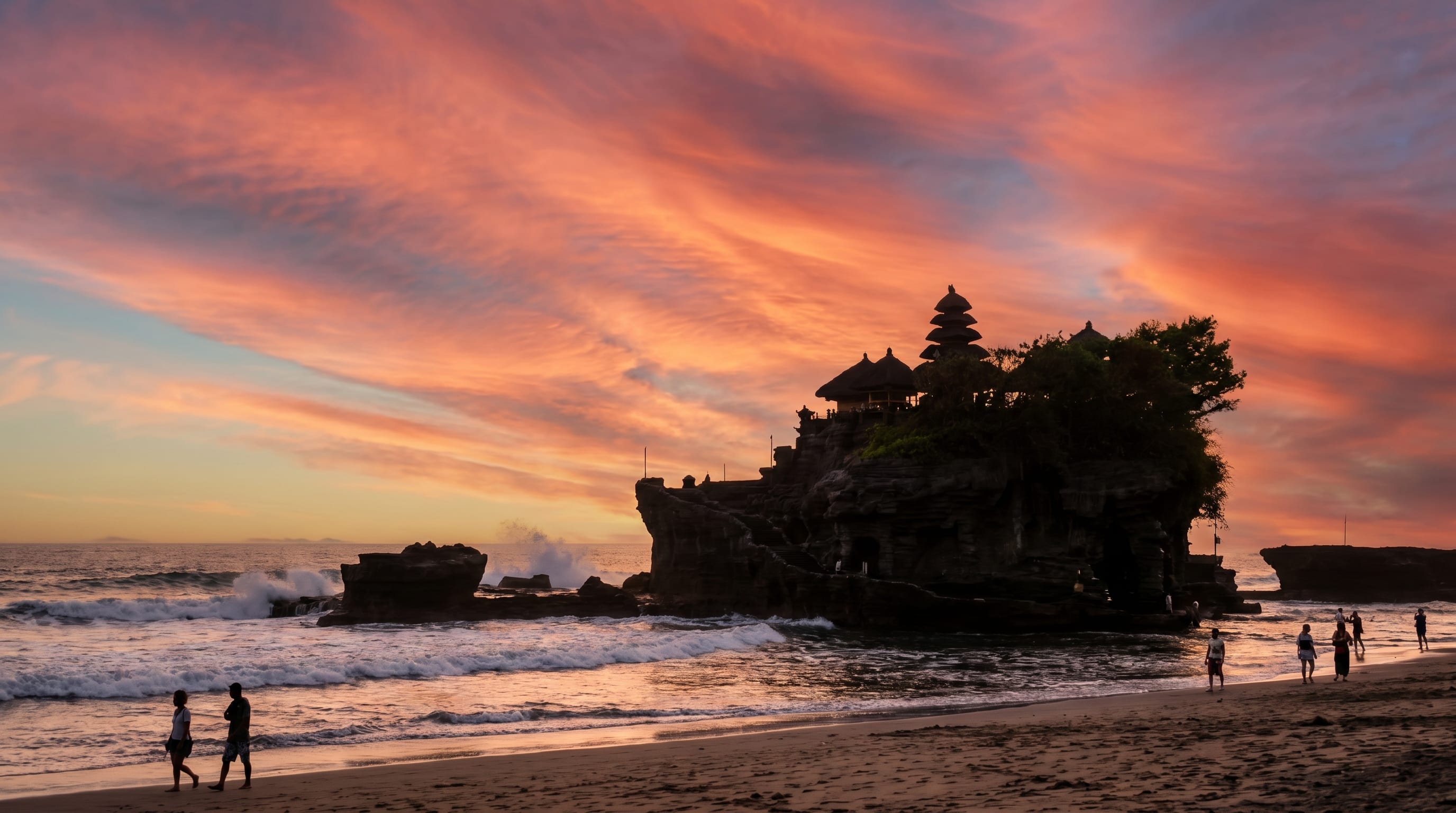 Tanah Lot sea temple at sunset, one of the iconic things to do in Bali