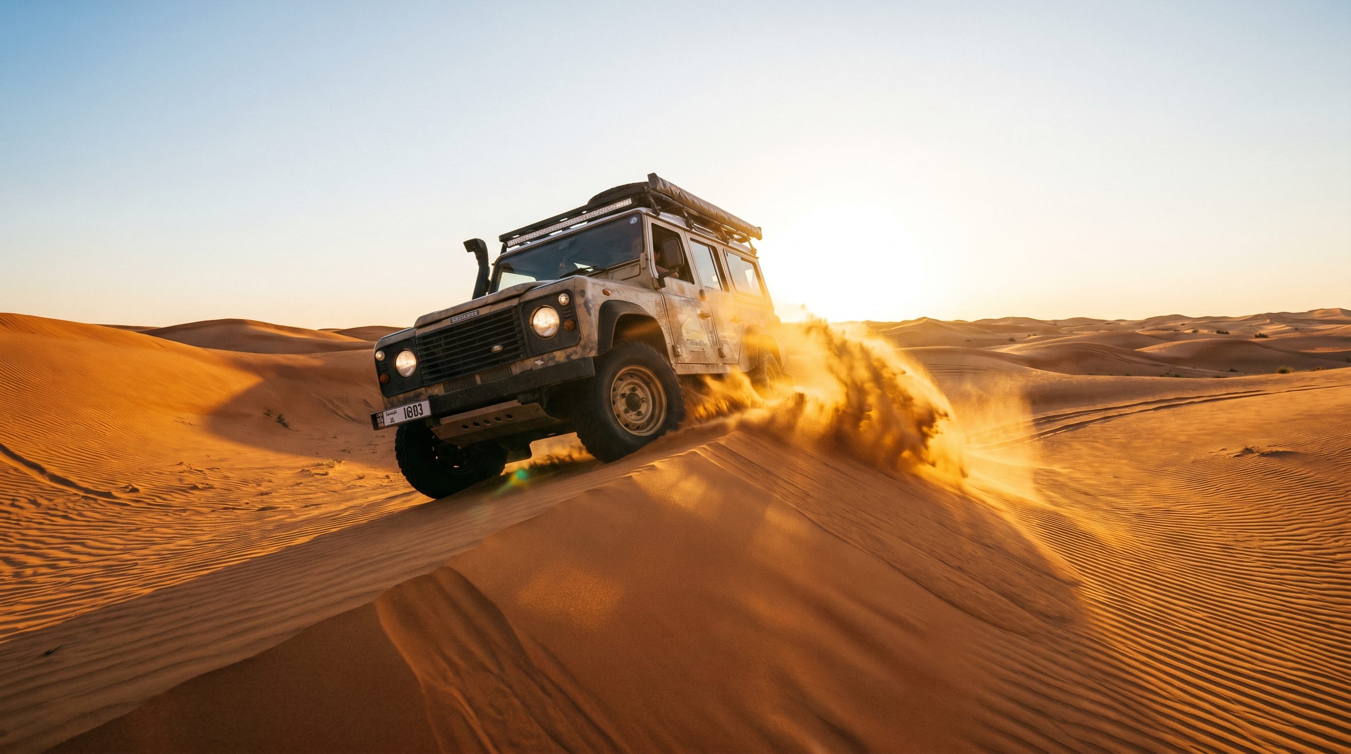4x4 dune bashing on a desert safari, a highlight of any Dubai trip from Bangalore