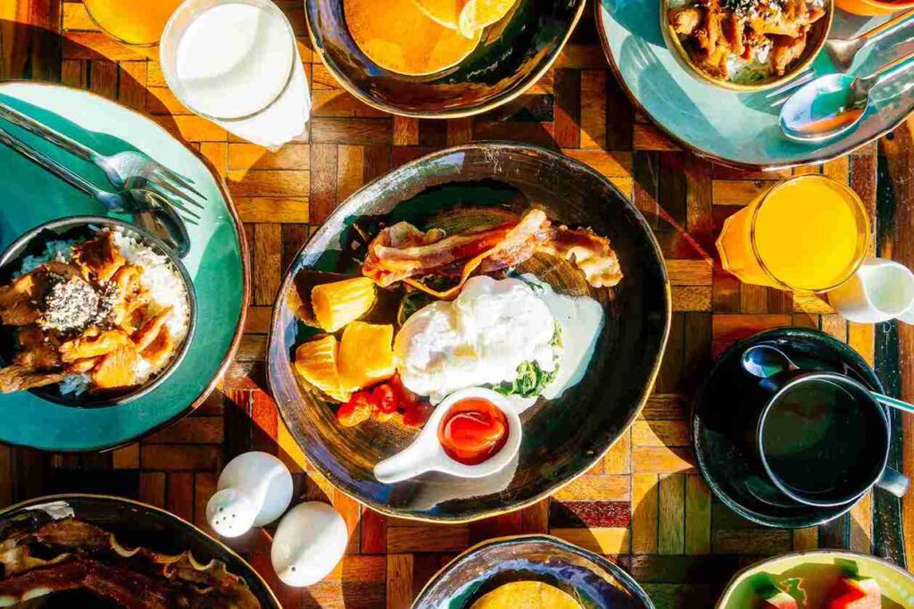 <a href="https://www.freepik.com/free-photo/healthy-breakfast-set-with-egg-bacon-pancakes-orange-juice-milk-bread-coffee_3661874.htm#fromView=search&page=1&position=3&uuid=ffb63b67-4dad-4163-9deb-ca6f09918396">Image by lifeforstock on Freepik</a>