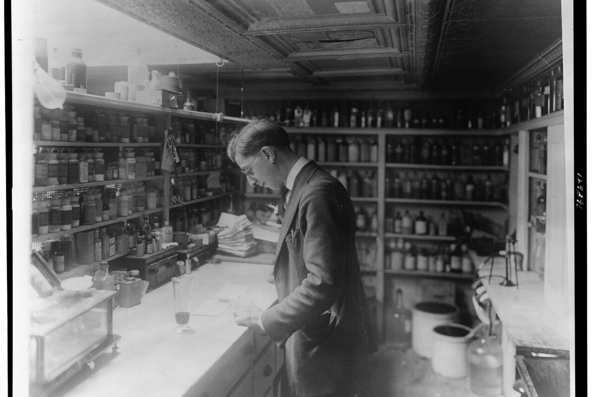 Pharmacy shelves with prescription medicine boxes