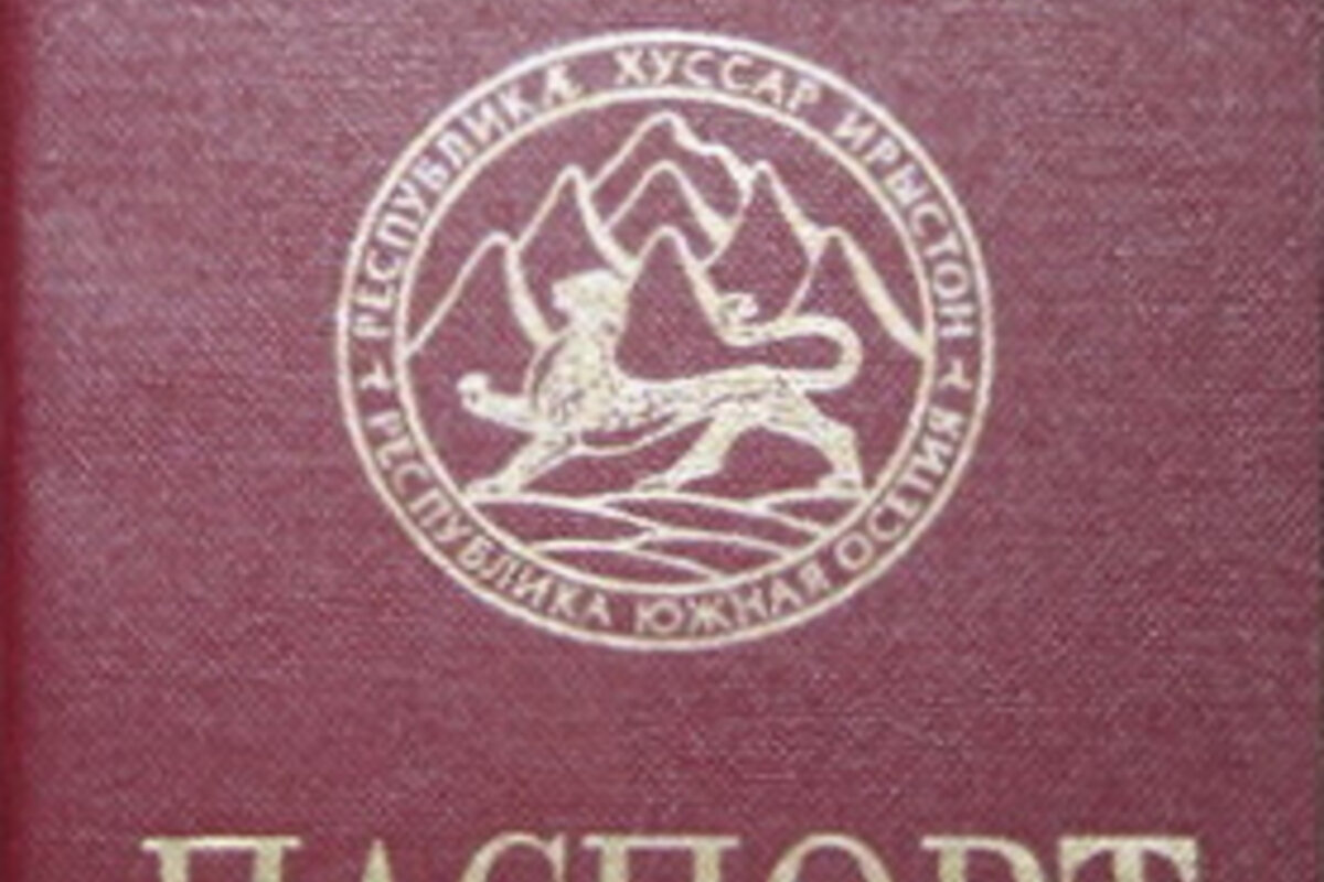 Passport and travel documents on desk
