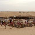 Red Dunes Desert Safari and Camel Ride with BBQ at Al Khayma Camp