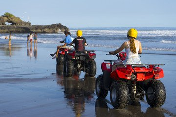 An exhilarating ATV ride through Bali’s rugged countryside, weaving through lush rice fields, muddy paths, and traditional villages, offering an adventurous way to explore the island’s natural beauty and remote landscapes