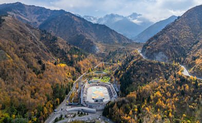 the world’s highest ice rink,  nestled in the Zailiyskiy Alatau Mountains surrounding beautiful nature in Almaty. 