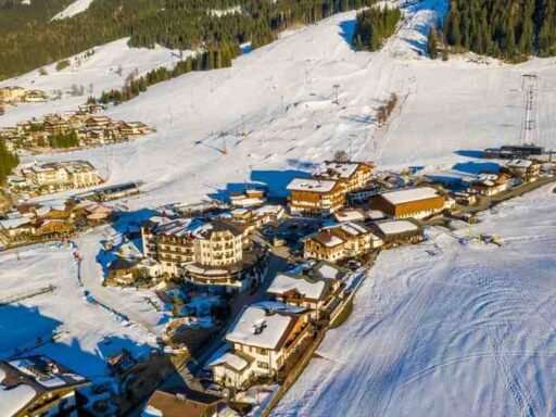 Aerial view of Almaty showcasing budget-friendly hotels and central city locations, perfect for travelers exploring affordable stays in the city