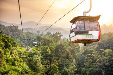 A Haven of Entertainment Featuring vibrant attractions, thrilling rides, and lively entertainment surrounded by scenic mountain views.