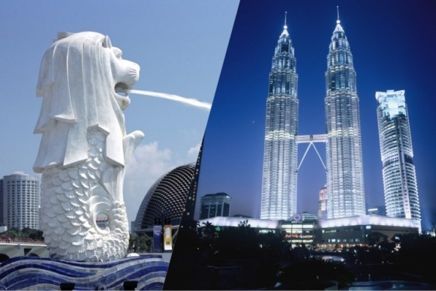 A captivating image featuring iconic landmarks from Malaysia and Singapore, including the majestic Petronas Twin Towers in Kuala Lumpur and the iconic Merlion statue in Singapore, symbolizing a blend of cultural and architectural marvels from both nations.